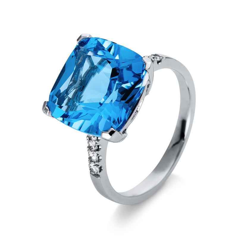Ring 4er-Krappe 18 kt WG. 8 Brillanten 0.16 ct. TW-si. 1 Blautopas 8.60 ct blau. Weite:55