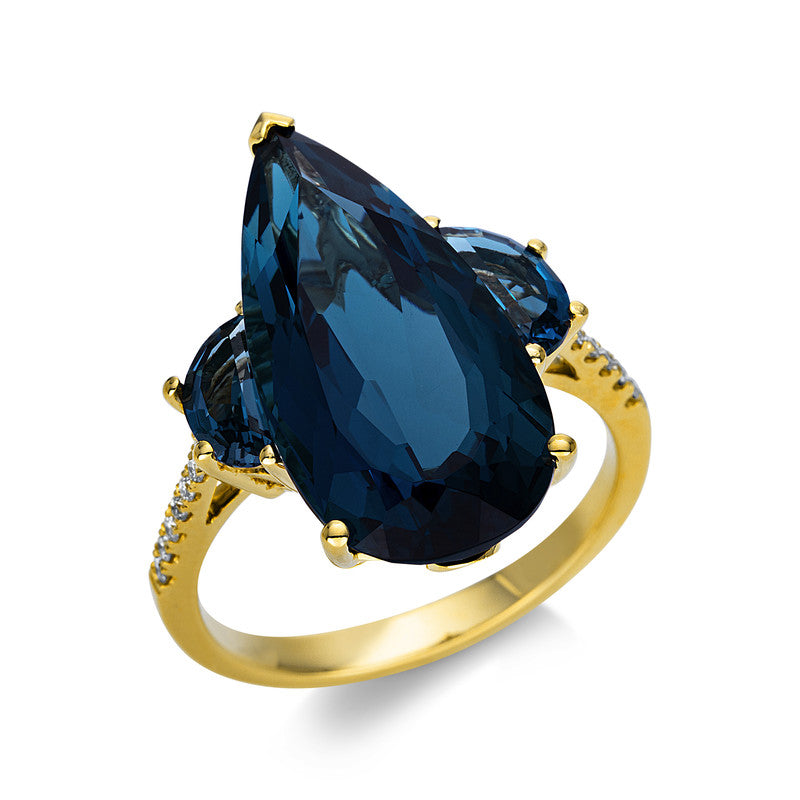 Ring 18 kt GG, 14 Brill. 0,09 ct, TW-si, 1 Topas 10,40 ct Lond. blue, 2 Topase 1,00 ct Lond. blue