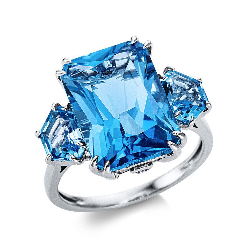 Ring 18 kt WG, 2 Brill. 0,05 ct, TW-si, 2 Topase 1,80 ct blau, 1 Topas 9,40 ct blau