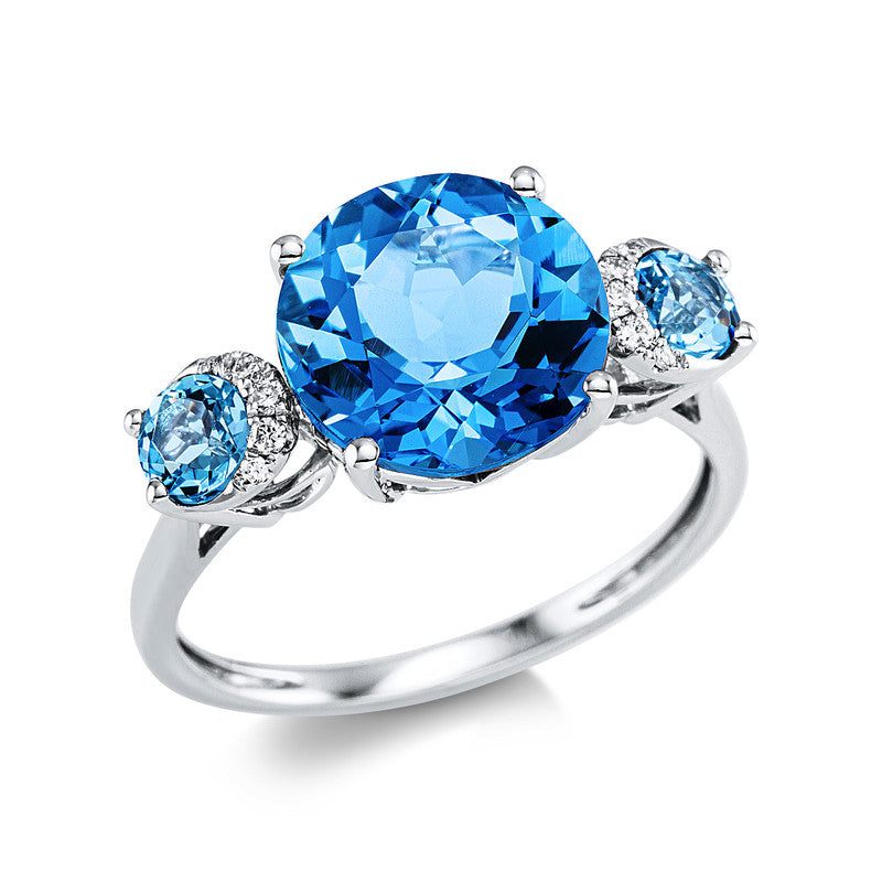 Ring 18 kt WG, 10 Brill. 0,05 ct, TW-si, 1 Topas 4,00 ct blau, 2 Topase 0,60 ct blau
