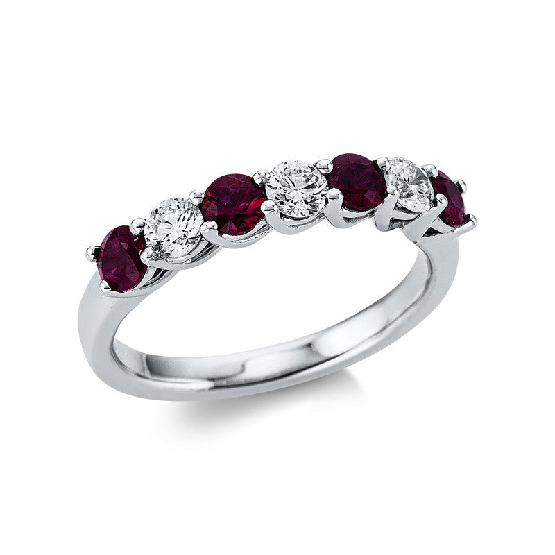 Ring 18 kt WG. 3 Brillanten 0.44 ct. TW-vsi. 4 Rubine 0.75 ct rot. B:3.5 mm. Weite:54
