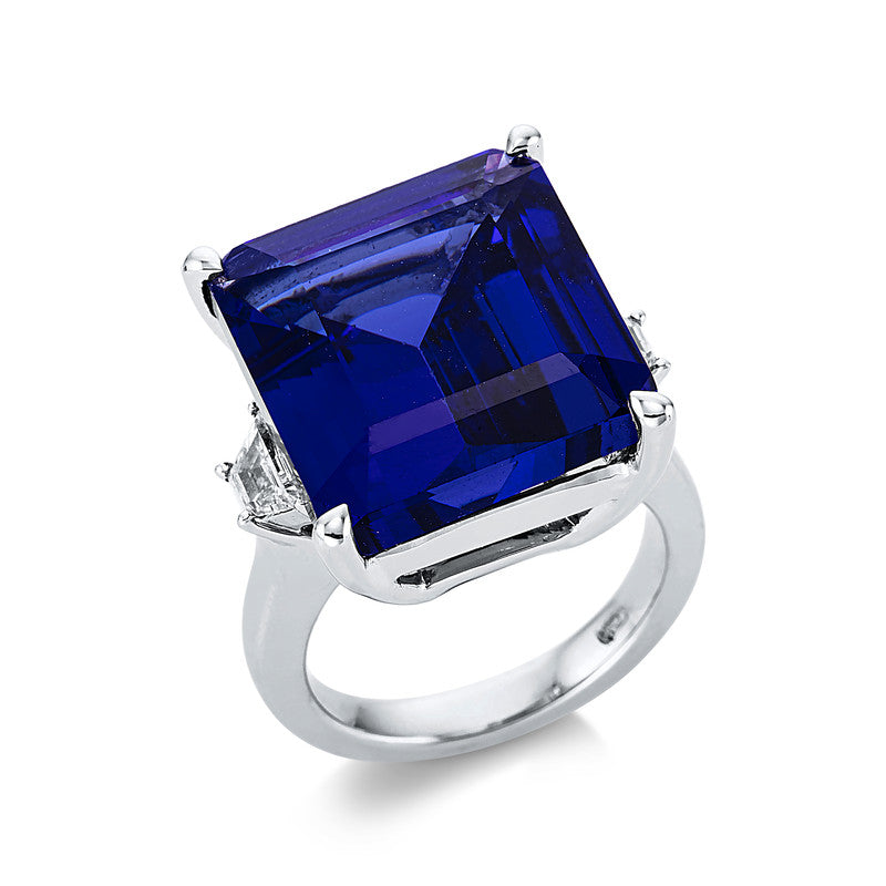 Ring 18 kt WG, 2 Trap. 0,53 ct, TW-si, 1 Tansanit 25,83 ct blau