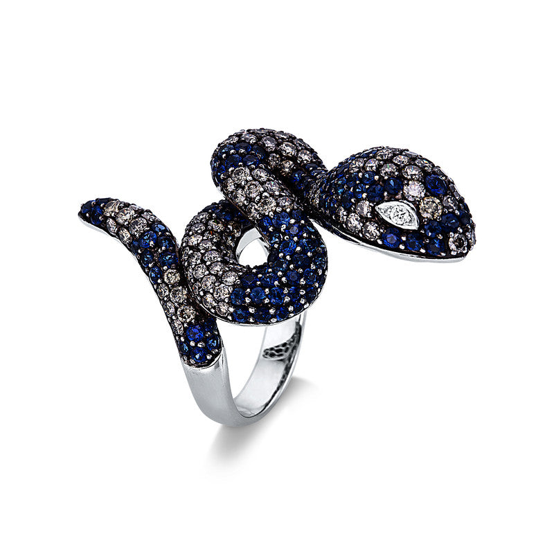 Ring 18 kt WG Schlange. Fassung schwarz rhodiniert. 2 Brillanten 0.04 ct. TW-vsi/si. 112 Brillanten 2.53 ct. braun. 127 Saphire 3.28 ct blau. Weite:54
