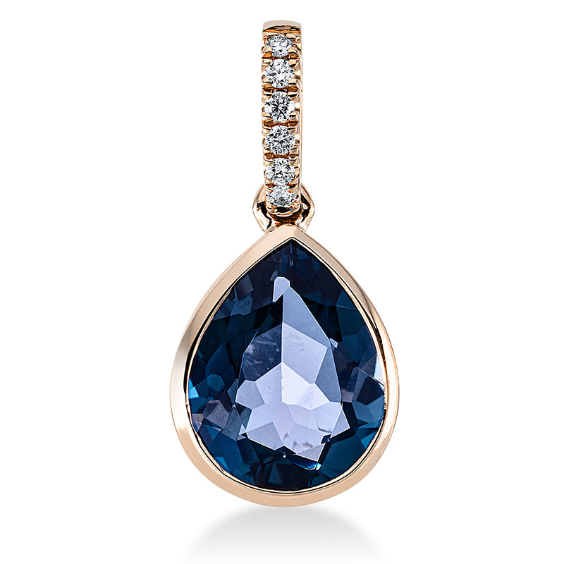 Anhänger 18 kt RG. mit Öse. 6 Brillanten 0.04 ct. TW-si. 1 Topas 3.10 ct Lond. blue. H:18.5 mm. B:8.8 mm. S:4.8 mm