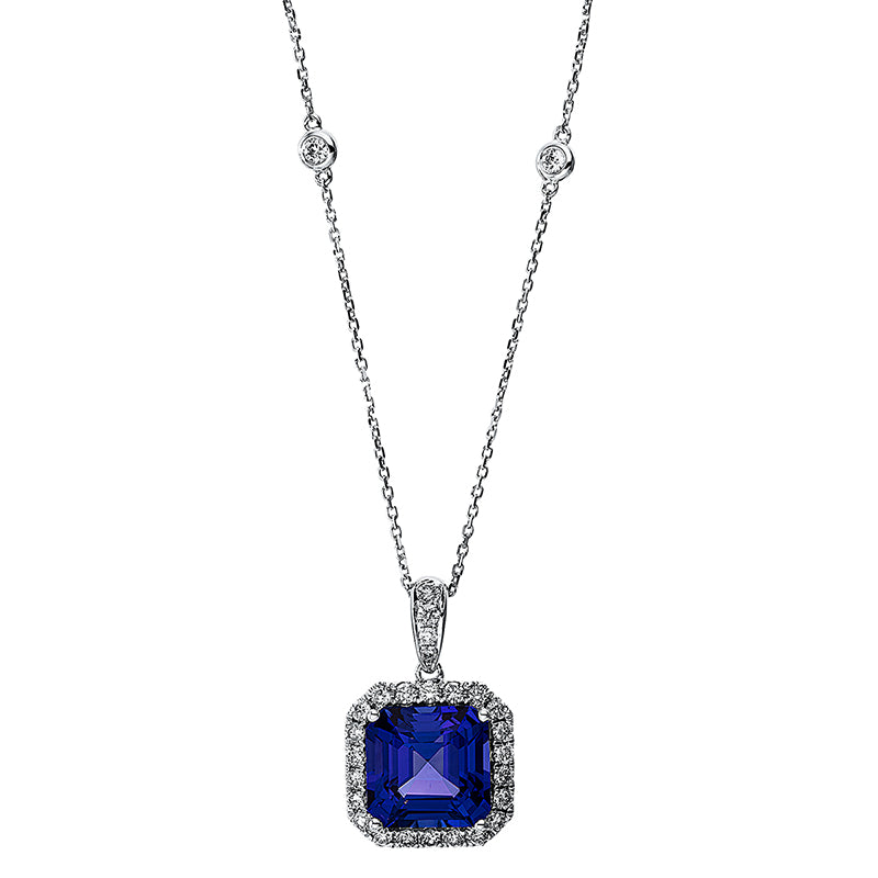 Collier 4er-Krappe 18 kt WG. mit ZÖ 40 cm + 43 cm. 28 Brillanten 0.69 ct. TW-si. 1 Tansanit 7.19 ct blau. L:45.7 cm