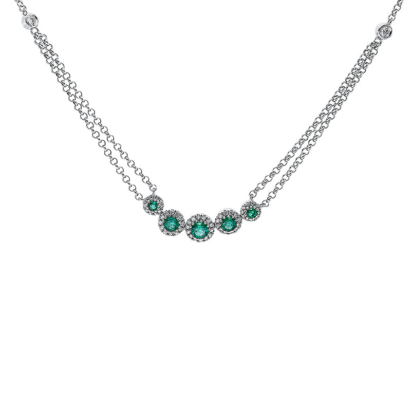 Collier 18 kt WG. mit ZÖ 41 cm + 43 cm. 2 Brillanten 0.08 ct. TW-si. 60 Brillanten 0.20 ct. TW-si. 5 Smaragde 0.73 ct grün. H:6.1 mm. B:28.0 mm. L:45.0 cm. S:3.9 mm