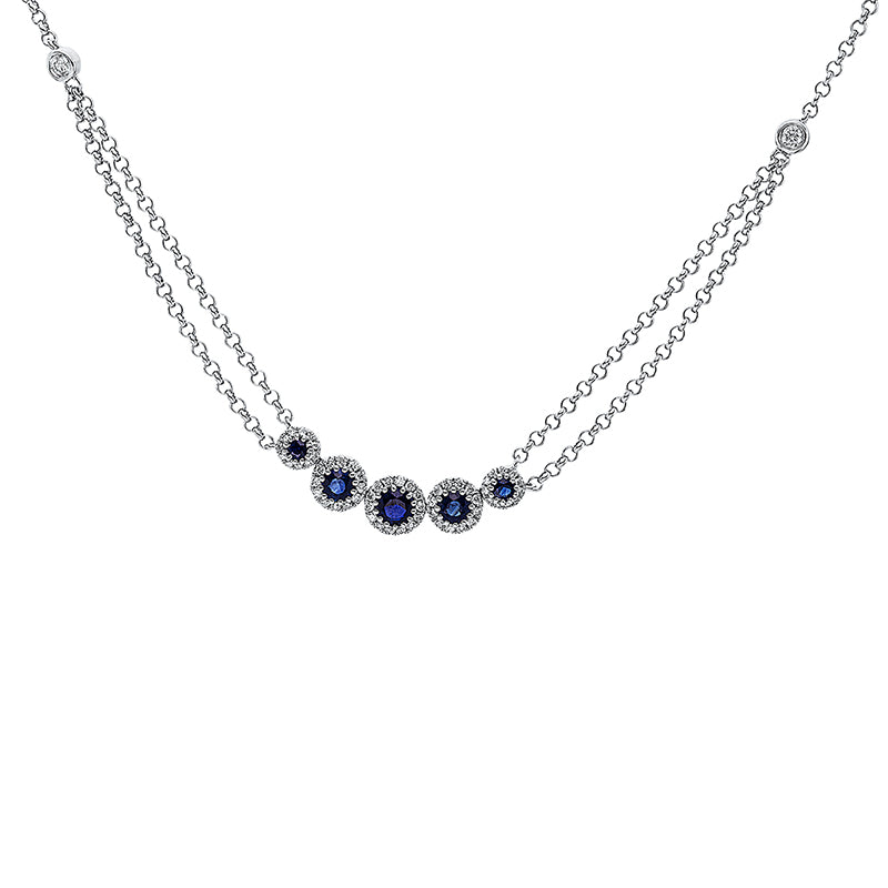 Collier 18 kt WG. mit ZÖ 41 cm + 43 cm. 2 Brillanten 0.08 ct. TW-si. 60 Brillanten 0.24 ct. TW-si. 5 Saphire 1.06 ct blau. H:28.3 mm. B:6.2 mm. L:45.0 cm. S:3.4 mm