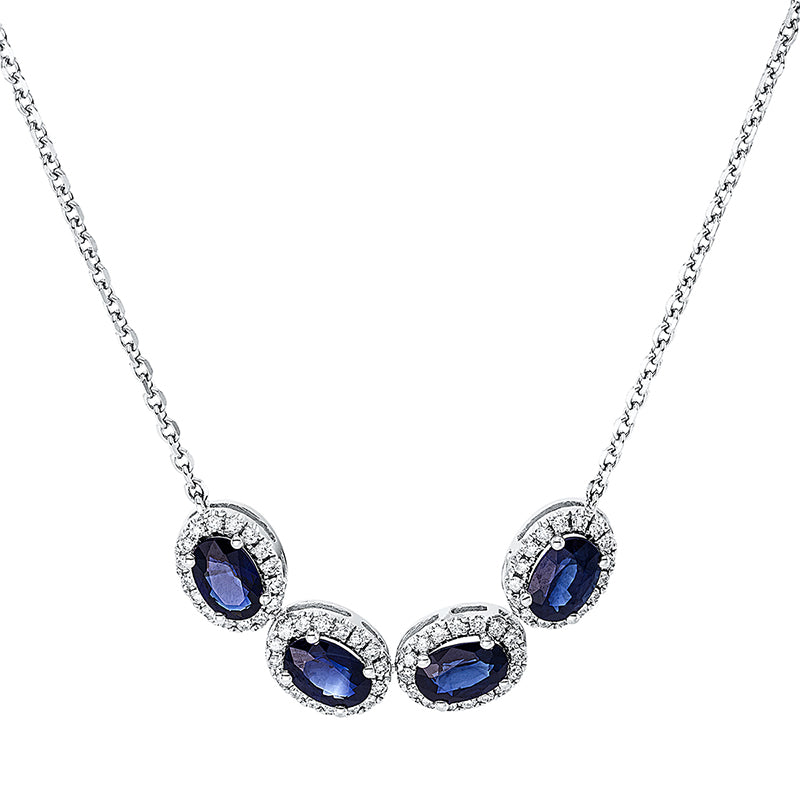 Collier 18 kt WG. mit ZÖ 40 cm + 42 cm. 64 Brillanten 0.29 ct. TW-si. 4 Saphire 2.20 ct blau. H:6.5 mm. B:36.2 mm. L:45.0 cm. S:3.6 mm