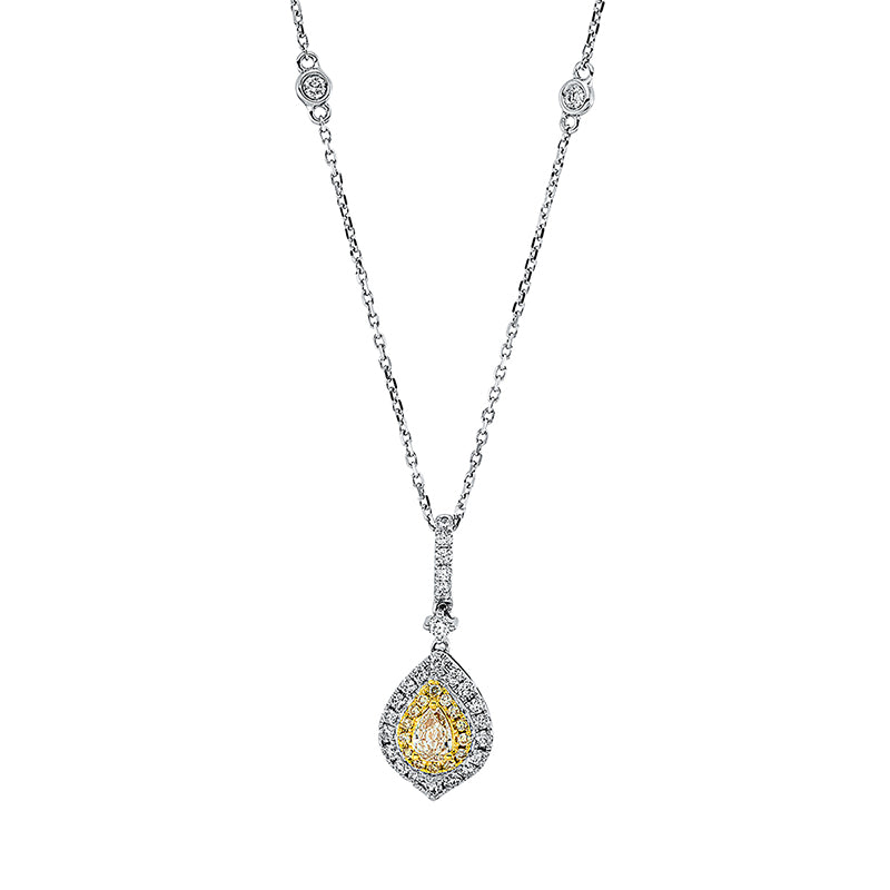 Collier 18 kt WG+GG. mit ZÖ 40 cm + 43 cm. 27 Brillanten 0.29 ct. TW-si. 1 Tropfen 0.21 ct. gelb. 14 Brillanten 0.07 ct. gelb. H:23.2 mm. B:9.2 mm. L:45.7 cm. S:4.5 mm