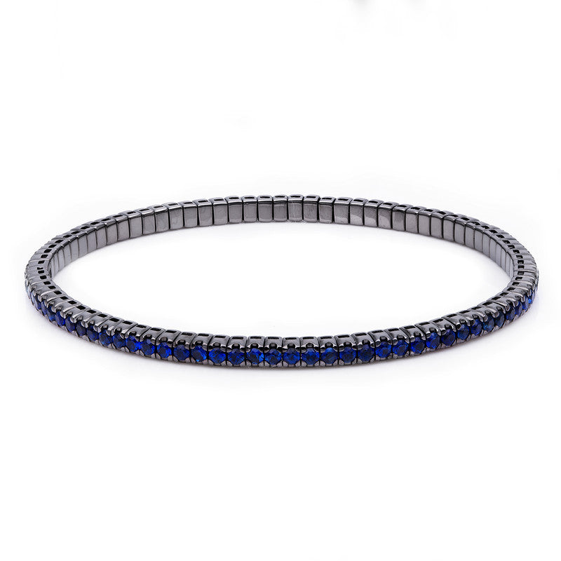 Armband 4er-Krappe 18 kt WG. Flex-Band. variabel. schw. rho. 87 Saphire 2.99 ct blau