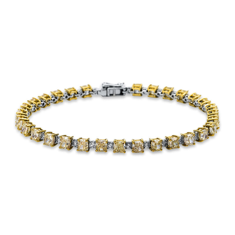 Armband 18 kt WG+GG. 31 Brillanten 1.43 ct. TW-si. 30 Diamanten 8.38 ct. gelb. B:3.9 mm. L:17.5 cm