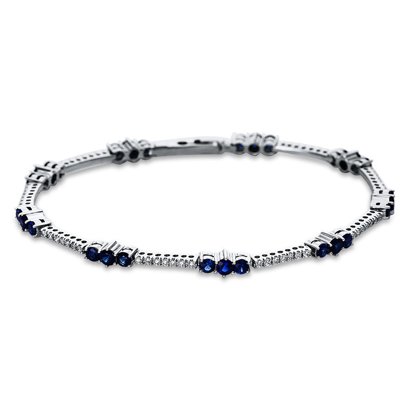 Armband 18 kt WG, 56 Brill. 0,44 ct, TW-vsi/si, 9 Saphire 1,03 ct blau, 18 Saphire 1,42 ct blau