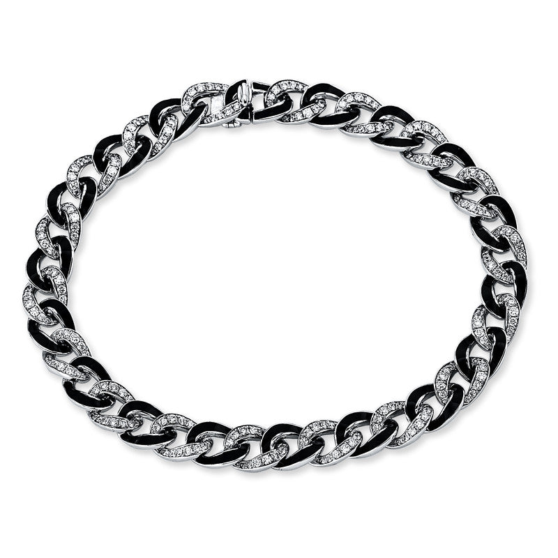Armband 18 kt WG. teils schwarz rhodiniert. 36 Brillanten 0.33 ct. TW-si. 215 Brillanten 0.98 ct. TW-si. L:17.8 cm