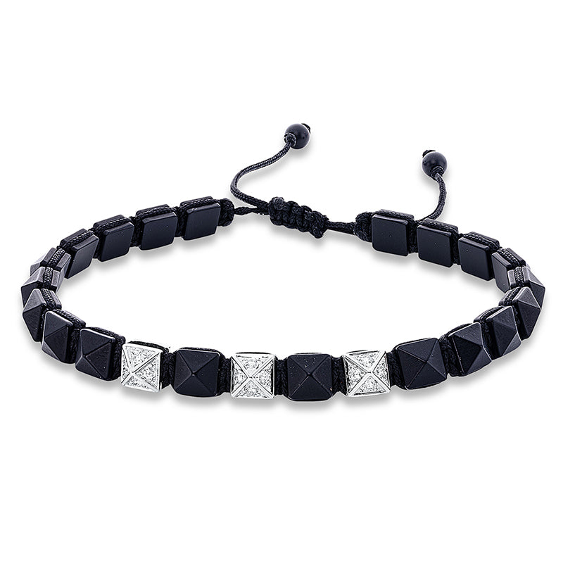 Armband 18 kt WG. black cord strap. 12 Brillanten 0.32 ct. TW-si. 22 Onyx 29.87 ct schwarz. L:31.0 cm