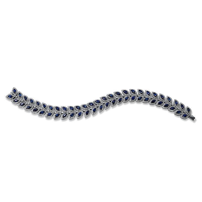 Armband 18 kt WG, 890 Brill. 3,44 ct, W-si, 54 Saphire 9,73 ct blau