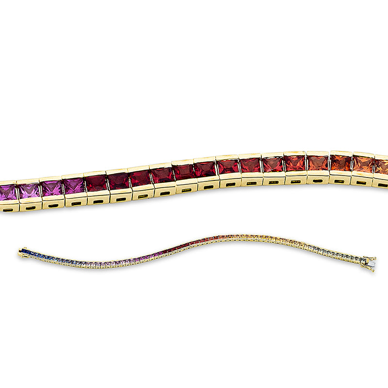 Armband 18 kt GG. 6 Rubine 0.43 ct rot. 67 Saphire 4.95 ct fancy. L:18.0 cm