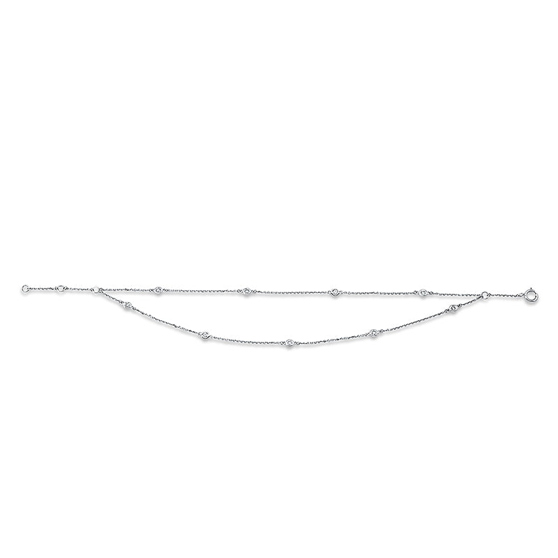 Armband 18 kt WG, 9 Brill. 0,19 ct, W-si
