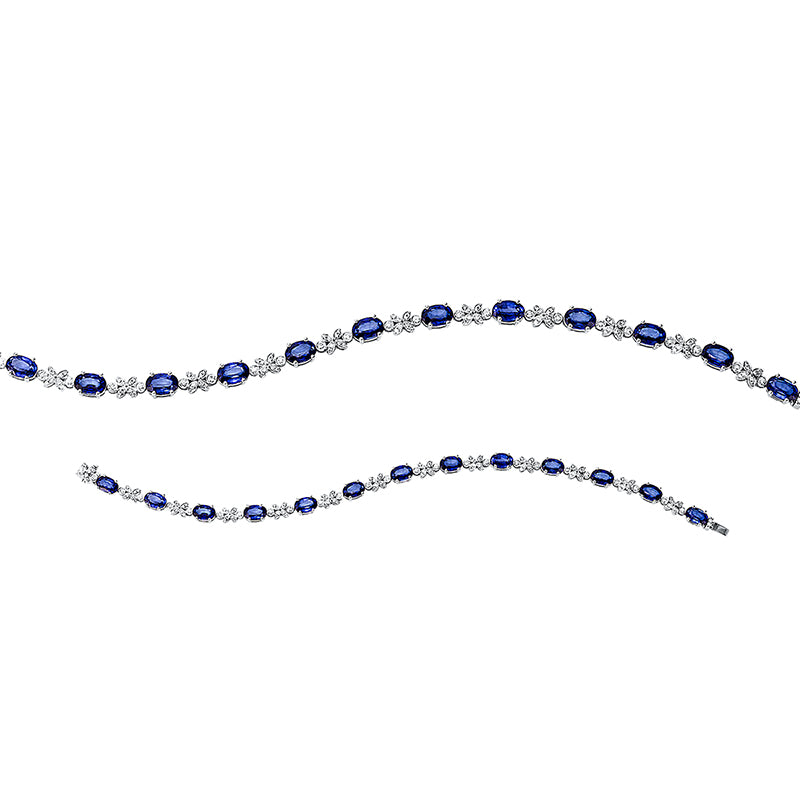 Armband 18 kt WG, 25 Brill. 0,30 ct, TW-si, 106 Brill. 0,26 ct, TW-si, 13 Saphire 8,32 ct blau