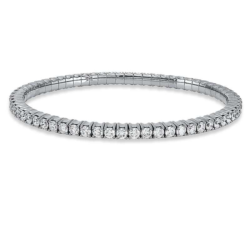 Armband 4er-Krappe 18 kt WG. Flex-Band. variabel. rhodinier. 64 Brillanten 5.05 ct. TW-si. B:3.6 mm. S:3.9 mm