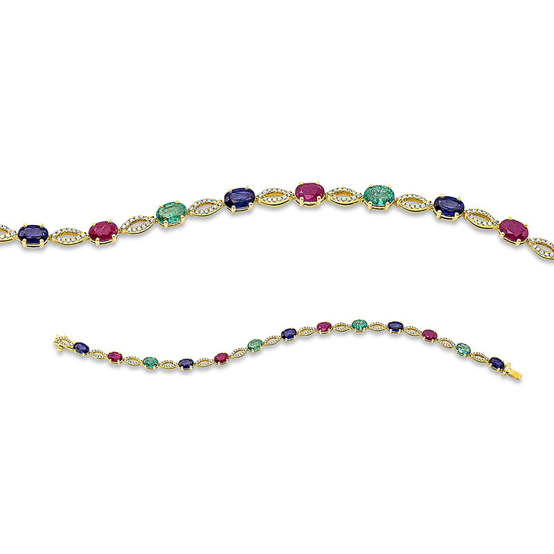Armband 18 kt GG. 156 Brillanten 0.42 ct. TW-si. 5 Saphire 3.08 ct blau. 4 Smaragde 1.64 ct grün. 4 Rubine 1.74 ct rot. B:4.3 mm. L:18.0 cm. S:3.7 mm