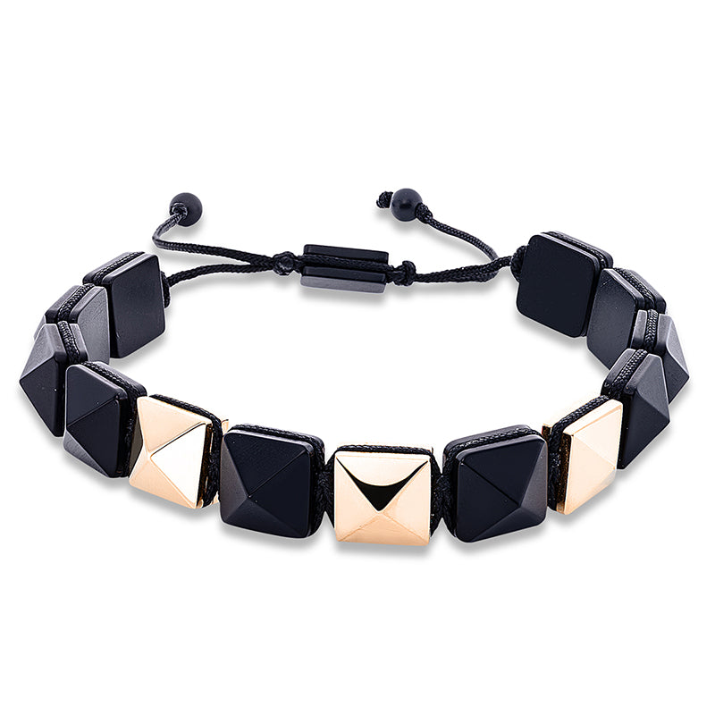 Armband 18 kt RG. black cord strap. 13 Onyx 59.57 ct schwarz. B:10.3 mm. L:31.0 cm. S:6.8 mm