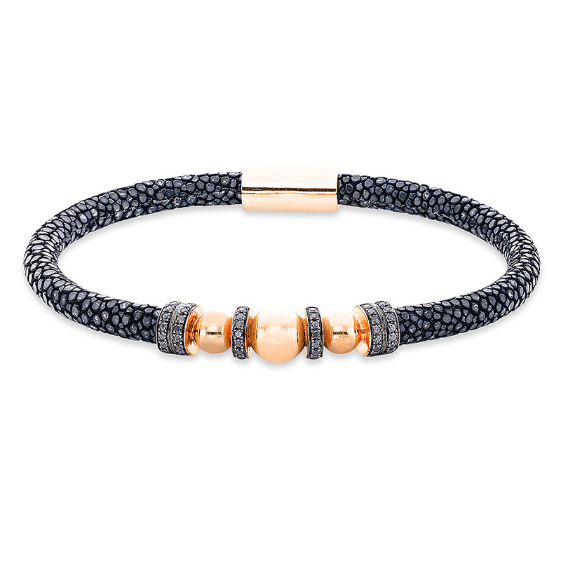 Armband 18 kt RG. Fassung teils schwarz rhodinie. 54 Brillanten 0.39 ct. schwarz. B:7.5 mm. L:20.0 cm. S:7.9 mm