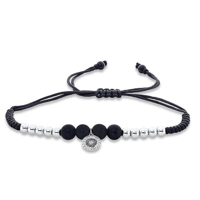 Armband 18 kt WG. Fassung teils schwarz rhodinie. 19 Brillanten 0.07 ct. TW-si. 9 Brillanten 0.03 ct. schwarz. 6 Onyx 6.81 ct schwarz. B:13.2 mm. L:31.0 cm. S:6.2 mm