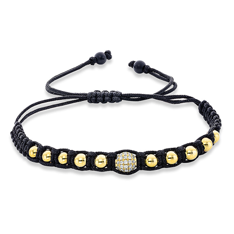 Armband 18 kt GG. black cord strap.gold ball. 31 Brillanten 0.16 ct. TW-si. 2 Onyx 0.99 ct schwarz. B:6.7 mm. L:31.0 cm. S:5.8 mm
