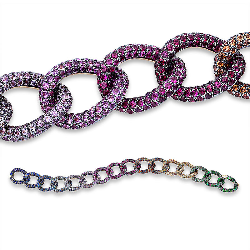Armband 18 kt GG. Fassung teils schwarz rhodinie. 1170 Saphire 15.52 ct multicolor. B:13.2 mm. L:18.0 cm. S:5.6 mm