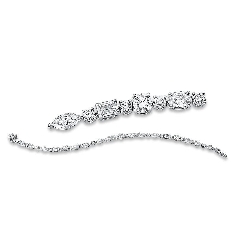 Armband 18 kt WG. 4 Sm.schliff 0.99 ct. TW-vsi. 4 Navette 0.98 ct. TW-vsi. 4 Oval 0.96 ct. TW-vsi. 4 Tropfen 0.93 ct. TW-vsi. 22 Brillanten 1.77 ct. TW-vsi. B:3.2 mm. L:16.5 cm. S:3.5 mm