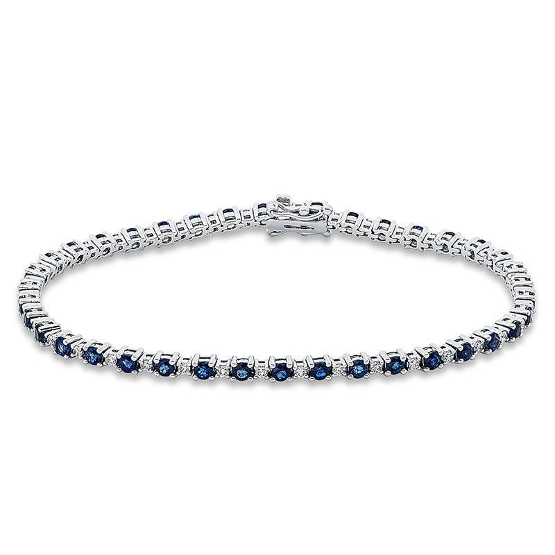Armband 4er-Krappe 18 kt WG. 38 Brillanten 0.56 ct. TW-si. 38 Saphire 2.99 ct blau. L:18.0 cm