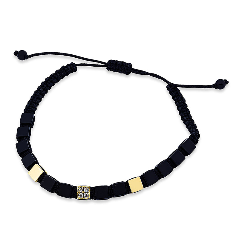 Armband 18 kt GG, schwarz rhodiniert, 4 Brill. 0,11 ct, braun, 14 Onyx 12,46 ct schwarz