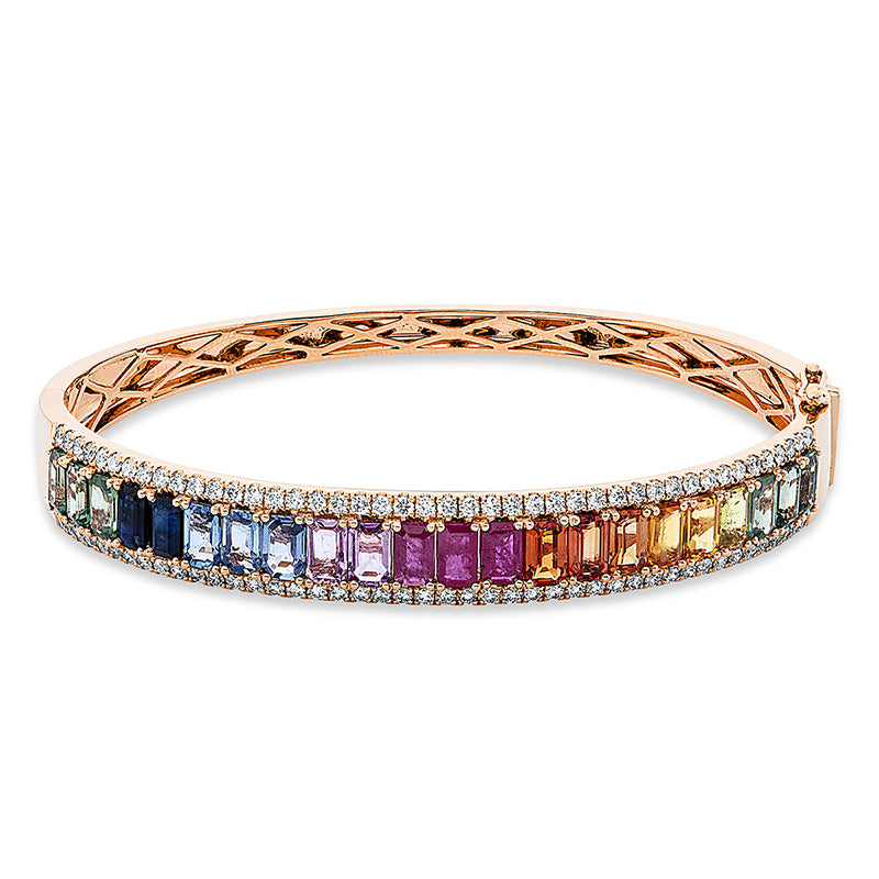 Armreif 18 kt RG, 88 Brill. 1,14 ct, TW-si, 1 Saphir 0,38 ct blau, 3 Rubine 0,96 ct rot, 18 Smaragde 6,44 ct fancy