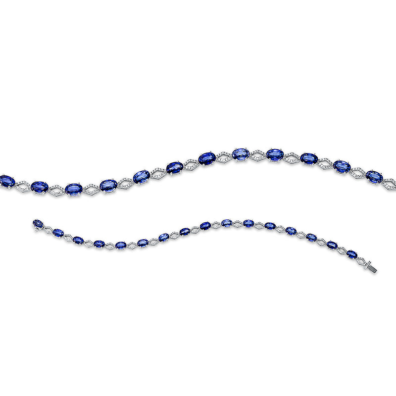 Armband 18 kt WG. 224 Brillanten 0.56 ct. TW-si. 16 Saphire 9.93 ct blau. B:4.4 mm. L:18.4 cm